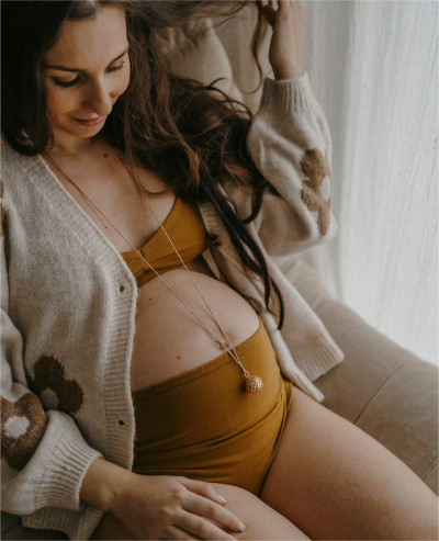 SOURCE Pregnancy Necklace...