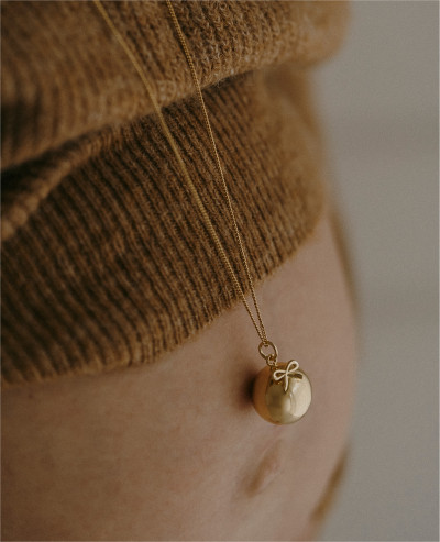 BOW Pregnancy necklace on...